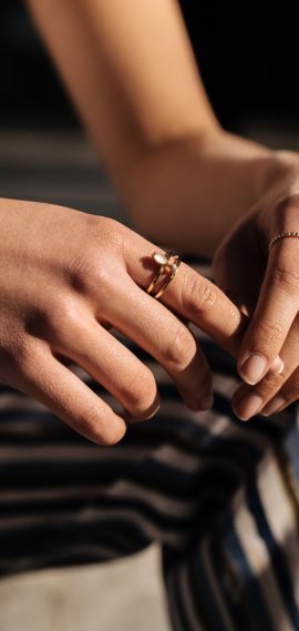 crop-woman-hands-with-rings-on-the-street-Y3WF8NB.jpg